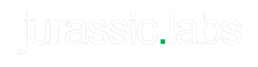 Jurassic Labs logo in logotype form. The text is white, with both words separated by a green dot.